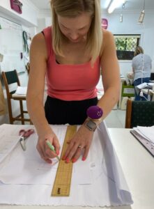 Gemma drafting a corset